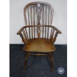 An antique elm and ash country chair