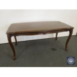 A shaped French coffee table on cabriole legs