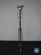 A Victorian brass rise and fall oil lamp stand