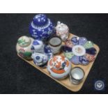 A tray of Oriental china including brush pots, lidded ginger jars, teapot etc.