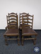 Four oak ladder back dining chairs