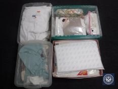 Five storage boxes containing curtains, towels, bedding etc.