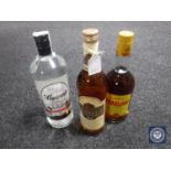 Three bottles of alcohol to include Nordhauser Gold Brand,