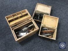 Three wooden boxes of vintage hand tools and door furniture