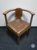A 20th century leather seated corner chair