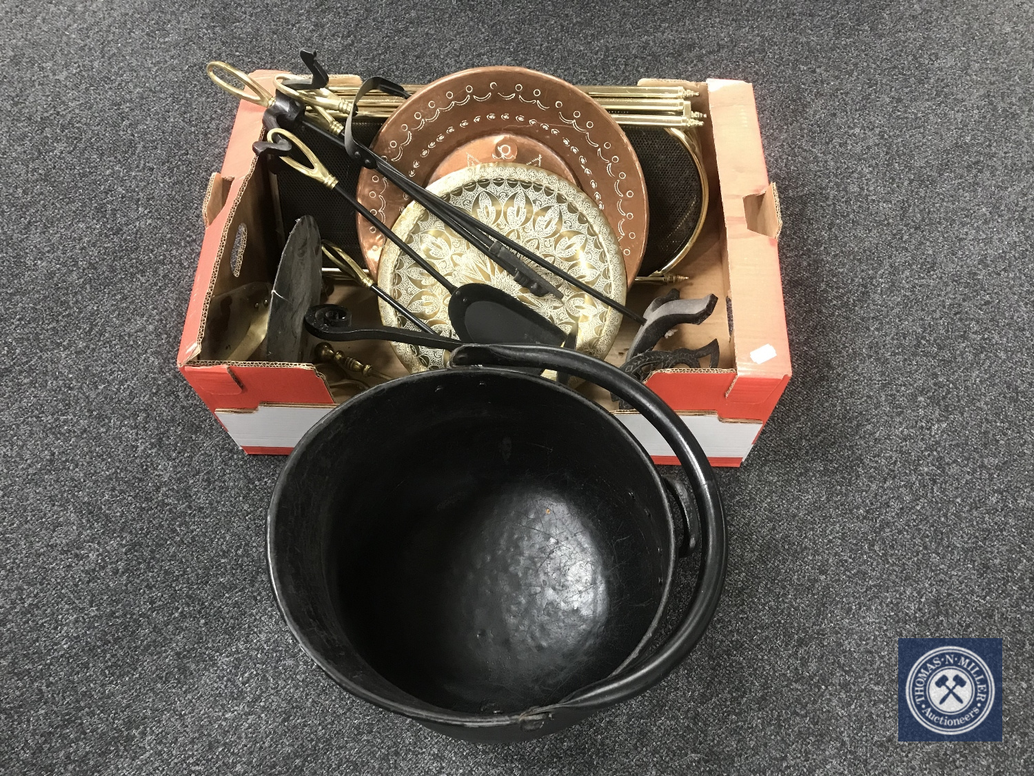 A coal bucket and a box of companion set, spark guard,