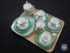 A twenty-one piece Victorian china Art Deco style tea service