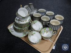 A tray containing Denby coffee cans and saucers,