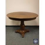 An early 20th century mahogany pedestal occasional table,