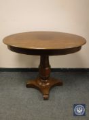 An early 20th century mahogany pedestal occasional table,