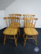 Four pine dining chairs and a pine stool