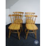 Four pine dining chairs and a pine stool