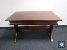 A mahogany sofa table