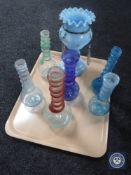 A tray of antique spiral twist glass bottles together with a part Victorian lustre