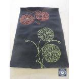 A hand tufted rug, floral black, 120 cm x 180 cm, rrp £297.00.