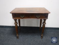 A Victorian mahogany writing table fitted two drawers