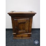 A 19th century oak wall cabinet fitted a drawer