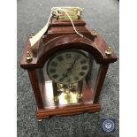 A Kundo quartz mantel clock CONDITION REPORT: Generally in good condition though