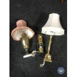 A brass miners lamp converted to a table lamp together with two further brass table lamps