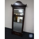 An antique mahogany framed hall mirror