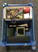 A basket of assorted costume jewellery,