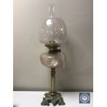 A Victorian brass oil lamp with glass reservoir,