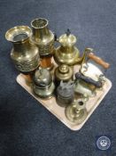 A tray containing two embossed brass vases, brass kettle, iron,