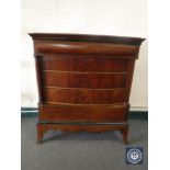 A late 19th century continental mahogany five drawer chest with pillar supports