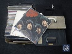 A box and three cases of LP's including Beatles, Nirvana,