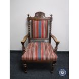 An early 20th century barley twist armchair