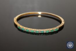A synthetic emerald bangle
