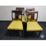 A set of four continental dining chairs