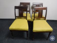 A set of four continental dining chairs