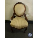 A mahogany spoon back armchair