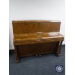 A walnut cased overstrung piano by Broadwood & Sons