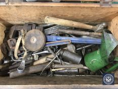A pine tool box containing hand tools