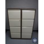 Two Bisley four drawer metal filing cabinets