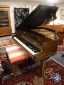 A mahogany cased baby grand piano by Lanstein, width 142.
