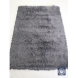 A hand knotted rug, silkie shaggy black, 120 cm x 180 cm, rrp £297.