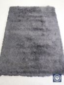 A hand knotted rug, silkie shaggy black, 120 cm x 180 cm, rrp £297.