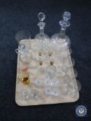 A tray of early twentieth century and later glass ware, decanters, liqueur glasses, tumblers etc.