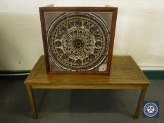 A tiled topped coffee table and a rectangular coffee table