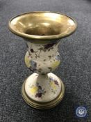A Victorian brass and pottery oil lamp base