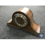 An oak cased mantel clock with key