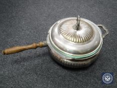 A silver plated dish with cover
