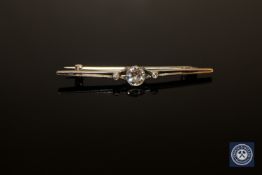 An early 20th century diamond bar brooch, the total diamond weight estimated at 0.