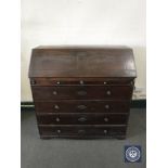 A 19th century continental oak bureau