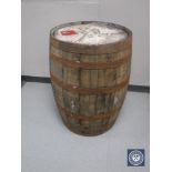 An oak coopered whiskey barrel