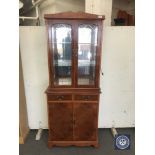 A yew wood display cabinet with cupboards and drawers CONDITION REPORT: 181cm high