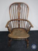An antique elm and ash country chair